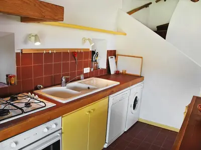 a kitchen with a sink and a stove at Holiday Home Les Geais by Interhome in Saint-Saturnin-les-Apt