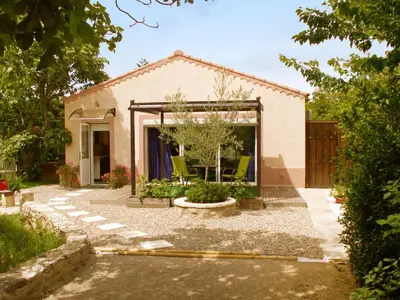 a home with a patio with chairs in the yard at Apartment Haider by Interhome in Caumont-sur-Durance