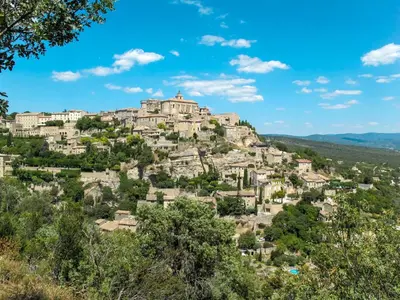 a village on top of a hill with houses at Holiday Home Les Ecureuils by Interhome in Saint-Pantaléon