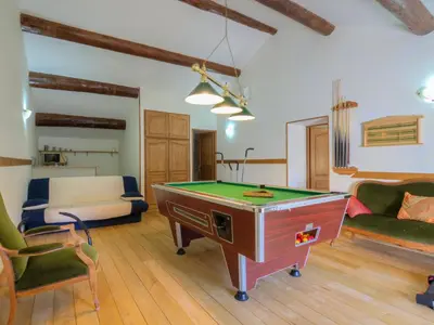 a living room with a pool table in it at Holiday Home de la Roque by Interhome in Althen-des-Paluds