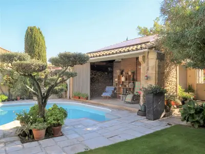 a house with a swimming pool in a yard at Holiday Home La Croix du Puits by Interhome in Robion en Luberon