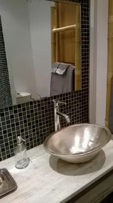a bathroom sink with a large bowl bowl at L'Auberge Espagnole - Bed & Breakfast in Apt