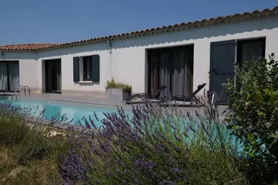 a house with a swimming pool in front of it at charming family house with pool located at L'isle sur la sorgue - sleeps 8 in LʼIsle-sur-la-Sorgue