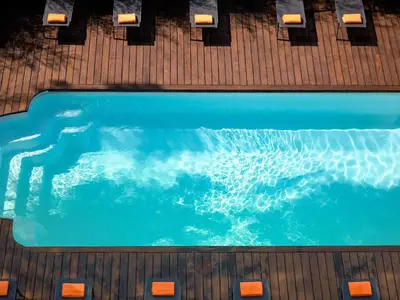 an overhead view of a swimming pool at Mercure Aix-en-Provence La Duranne Gare TGV in Aix-en-Provence