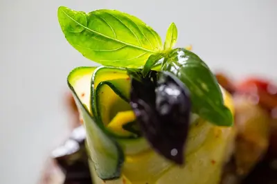 a butterfly sitting on top of a drink with a leaf on top at Villa Saint-Ange in Aix-en-Provence