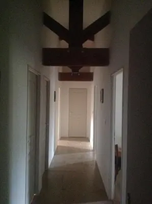 a hallway of a house with a ceiling at La Jacquemarie in Monteux