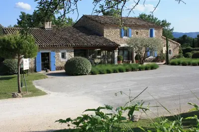 a house with a driveway in front of it at Mas De La Senancole & Spa in Gordes