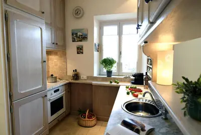 a kitchen with a sink and a counter top at Le Bonheur in Gordes