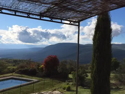 a view of the mountains from a house at La Bastide de Ninou maison de vacances Luberon in Viens