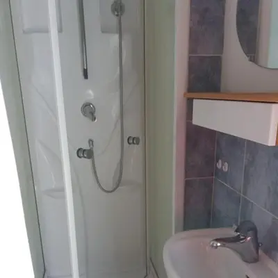 a bathroom with a shower and a sink at Domaine de la Marie dans le Luberon in Peypin-dʼAigues