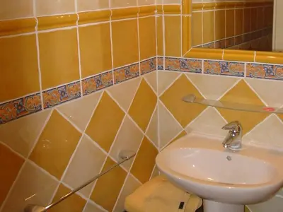 a bathroom with a sink and a toilet at Demeure d'hôtes et Mas Maurice in Oppède