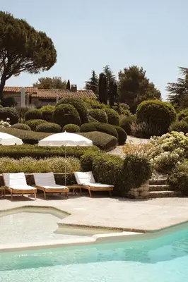 a dining room with a table and chairs at Capelongue, a Beaumier hotel & Spa in Bonnieux