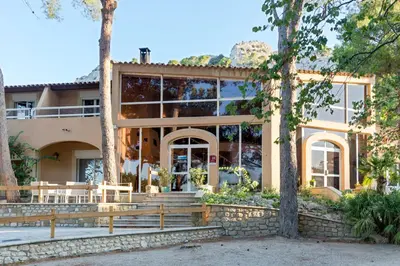 a house with trees in front of it at Best Western Domaine de Roquerousse in Salon-de-Provence