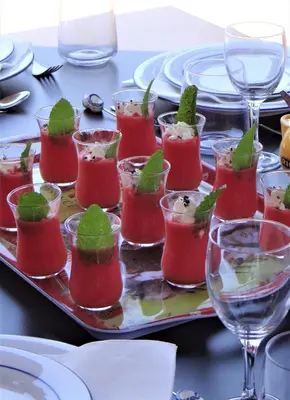 a tray with a bunch of cocktails on a table at Gîte et maison de vacances Campagne Valérie in Aix-en-Provence