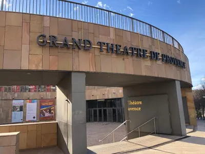 a building with a sign that reads grand theatre bevier at Toits Vieil Aix - Appartement de charme avec terrasse d'exception centre ville historique proche Cardeurs Et Mairie in Aix-en-Provence