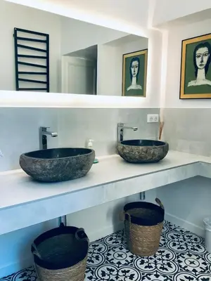 two sinks sitting on a counter in a bathroom at Château de Saint-Girons - Luxury Guest House in Provence in Aix-en-Provence