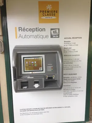 an advertisement for a recitation automatic machine at Premiere Classe Salon De Provence in Salon-de-Provence
