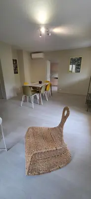 a room with a room with a table and chairs at Gîte Charmant avec Piscine et Terrasse en Provence MDV in Carpentras