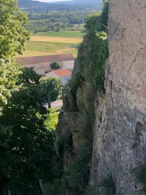 a view from the side of a stone wall at Havre de paix en Provence in Lauris