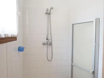 a shower with a shower head in a bathroom at Holiday Home near Mont Ventoux Ski Resort in Bédoin