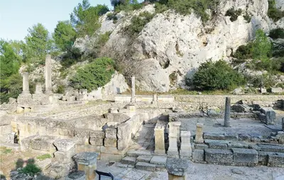 an ancient amphitheater in front of a mountain at Awesome Home In Saint-Rémy-De-Provence in Saint-Rémy-de-Provence