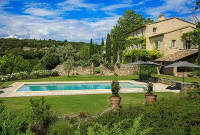 a house with a swimming pool in a yard at Mas de Michel in Bonnieux