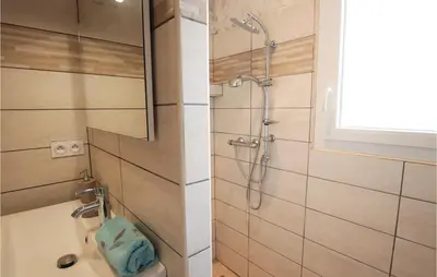 a bathroom with a shower and a toilet at Stunning Home In Monteux in Monteux