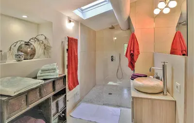 a bathroom with a sink and a shower in it at 4 Bedroom Stunning Home In Lagnes in Lagnes