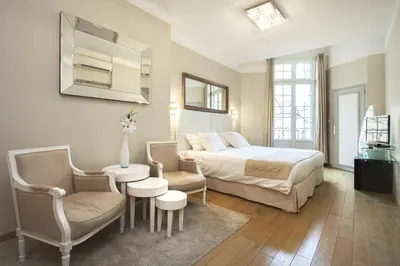 a bathroom with a sink and a shower at Hôtel de France in Aix-en-Provence