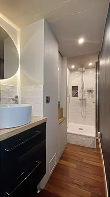 a bathroom with a sink and a shower at DUPLEX MIRABEAU - Roof terrace with panoramic view in Aix-en-Provence