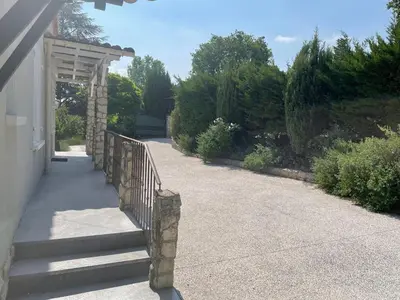 a stairway leading to a house with a fence at Villa Camille in Céreste