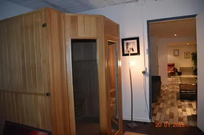 a room with a door open to a living room at Villa Lumières in Goult
