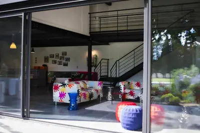 a store window with two couches in a room at provencal farm house with heated pool located to salon de provence, 12 people in Salon-de-Provence