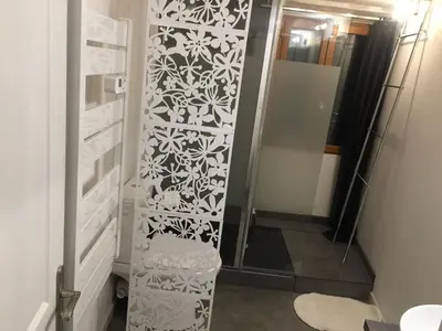 a bathroom with a shower with a glass door at Maison de village - Monteux centre - Provence in Monteux