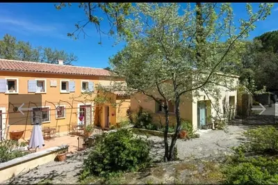 an exterior view of a house at Mas du Kairos - Gite Romarin in Venasque