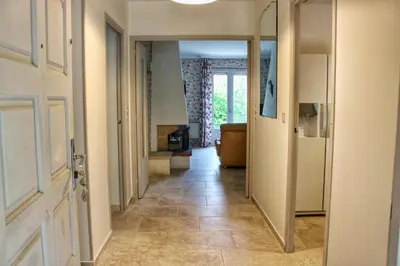 a hallway with a hallway leading into a room with a hallway at Villa piscine face au grand luberon Cereste in Céreste