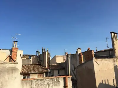 a view of the rooftops of buildings at Studio moderne à Aix-en-Provence - 20 m² avec terrasse ! in Aix-en-Provence