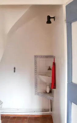 a bathroom with a sink on a wall at Charmante villa à Dauphin avec piscine privée et jardin in Dauphin