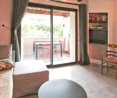 a living room with a couch and a table at Charmante villa à Dauphin avec piscine privée et jardin in Dauphin