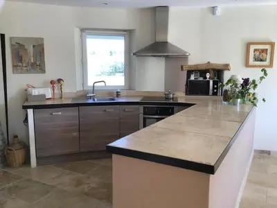 a kitchen with a sink and a counter top at Mas du Figuier Oppede Luberon in Oppède