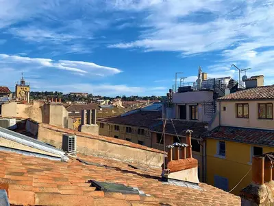 a view of a city from the roofs of buildings at LE FOCH in Aix-en-Provence