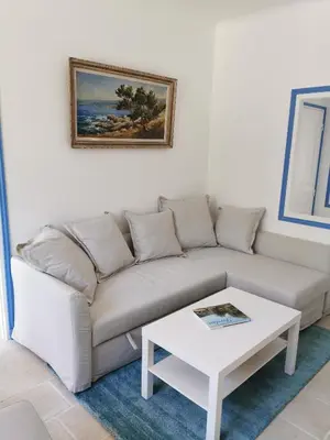a living room with a couch and a coffee table at Mas de Férigoulet -