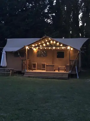 a large tent with lights on top of it at Lodge St Exupéry in Le Thor