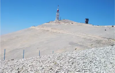 a lighthouse on the top of a hill with a mountain at Nice Apartment In Caumont-Sur-Durance in Caumont-sur-Durance