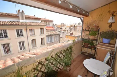 a balcony with a view of a city at LE DIX Duplex historical center balcony with view and air conditioning in Aix-en-Provence