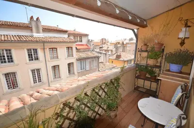a balcony with a view of a city at LE DIX Duplex historical center balcony with view and air conditioning in Aix-en-Provence