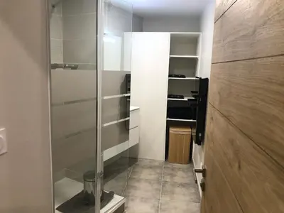 a bathroom with a glass shower in a room at Gite au cœur du ventoux in Bédoin