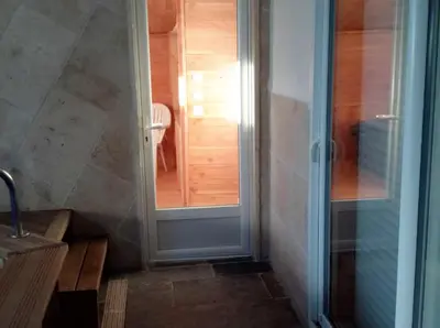 a bathroom with a shower and a glass door at Maison charmante à Aix-en-Provence avec piscine privée in Aix-en-Provence