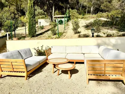 a couch and two chairs and a table at Mas d'Olea - heated swimming pool - airco - 14pers in Lauris