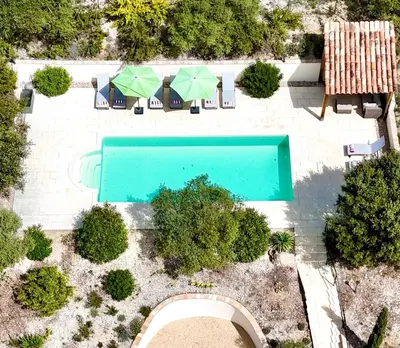 an overhead view of a swimming pool in a yard at Mas d'Olea - heated swimming pool - airco - 14pers in Lauris